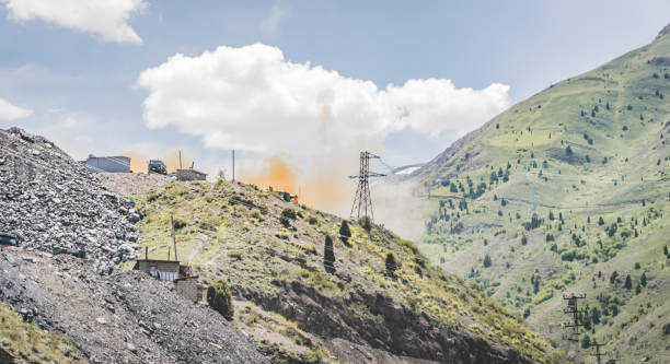 istock Blowing up rock with explosive means high in the mountains, engineering rock blasting 2152971481