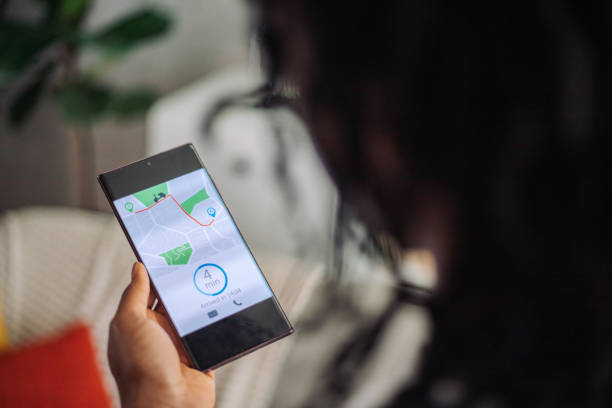istock Person holding smartphone with map app 2152972171