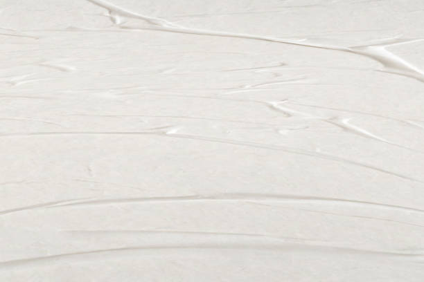 istock White blank crumpled and creased paper poster texture background 2152976795