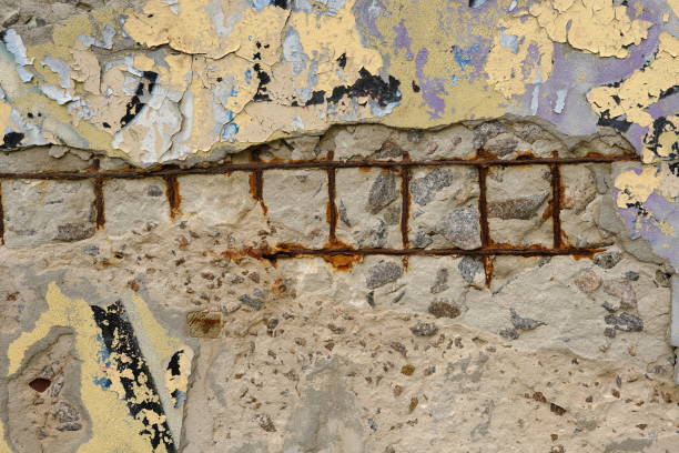 istock Old reinforced concrete structure with damaged and rusty metallic reinforcement that must be demolished - Metal bars rusty due to water infiltration into concrete 2152977767