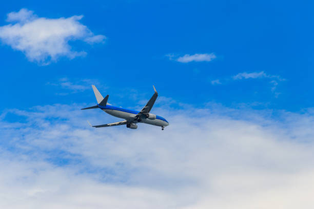 Passenger airplane flying in the blue sky