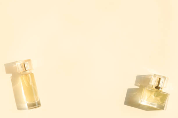 istock Perfume bottle on beige background, Glass bottle of perfumery 2153000662