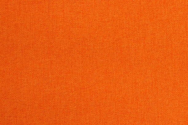 Orange cotton fabric texture background, seamless pattern of natural textile.