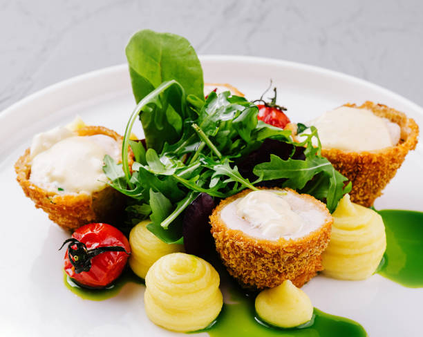 istock Gourmet goat cheese salad on white plate 2153006200