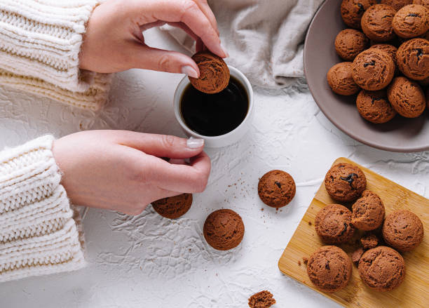 istock Enjoying freshly baked cookies with coffee 2153006360