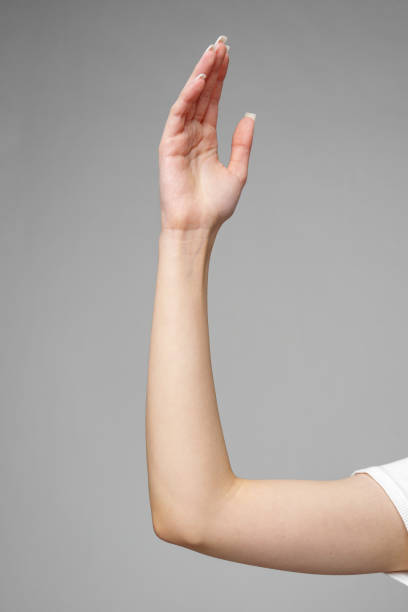 istock Female hand gesturing sign against gray background 2153009014