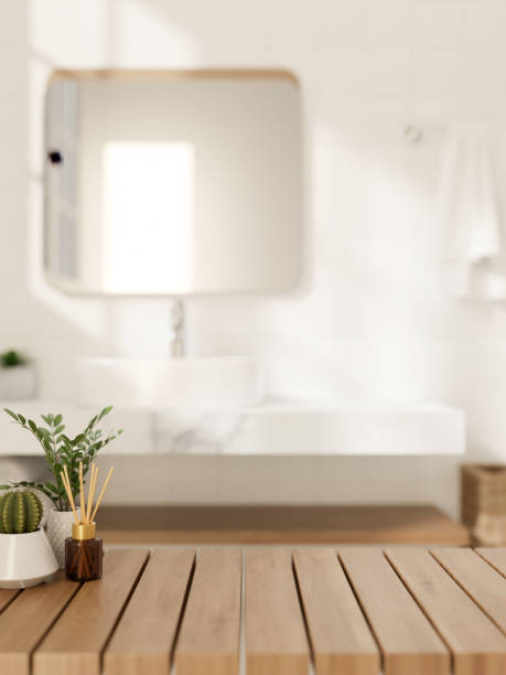 istock A space for showcasing products on a wooden table in a modern, luxurious white bathroom. 2153012586