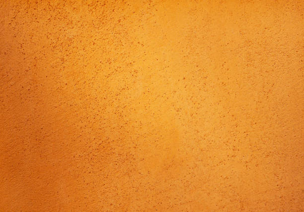 Part of a blank textured clean beige concrete wall.