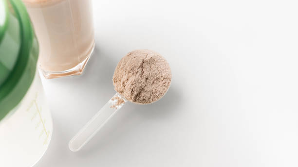 istock Whey protein powder in measuring scoop 2153015940