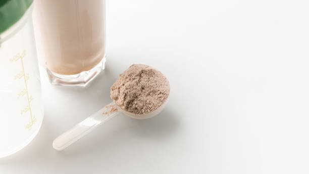 istock Whey protein powder in measuring scoop 2153015958