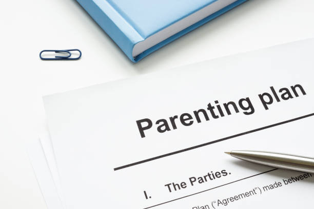 istock Parenting plan document and pen for signature. 2153016214