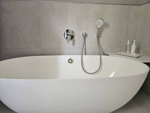 istock Large White Bathtub in a Bathroom 2153017109