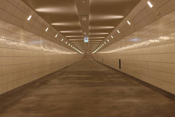 View along an underground pedestrian tunnel beneath a river