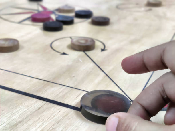 istock Carrom board with carrom coins arranged in center 2153020393