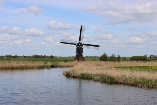 istock Traditional windmill in the countryside 2153021478