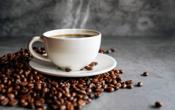 istock Coffee cup and coffee beans on  gray background, Black coffee cup aromatic 2153024063