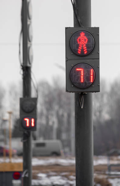 istock Red traffic light for a pedestrian with a countdown 2153026376