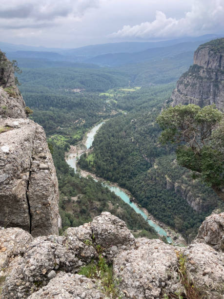 istock A river runs through a valley of rocks in canyon 2153032005