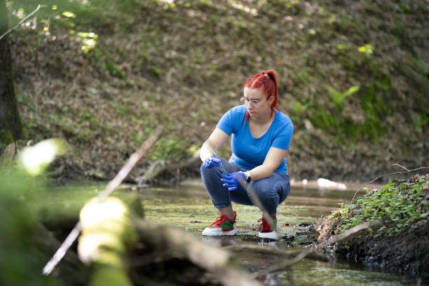 istock A young female biologist scientist taking water sample 2153035745