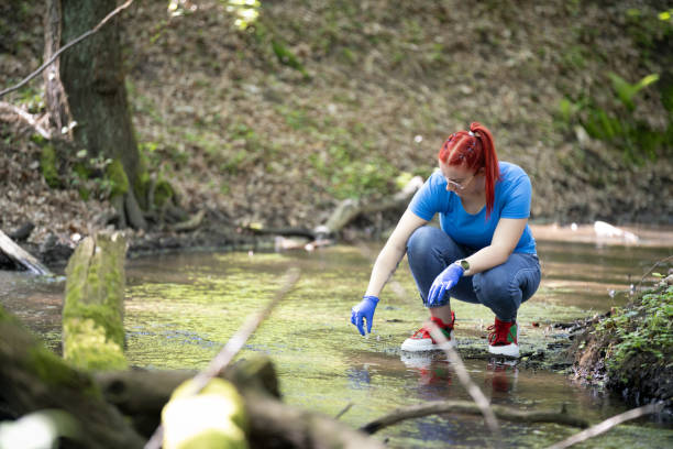 istock A young female biologist scientist taking water sample 2153035750