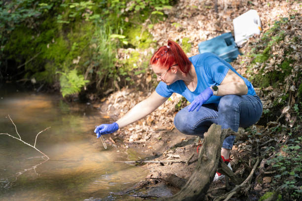 istock A young female biologist scientist taking water sample 2153035981