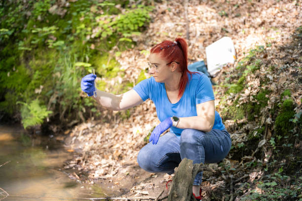 istock A young female biologist scientist taking water sample 2153036047