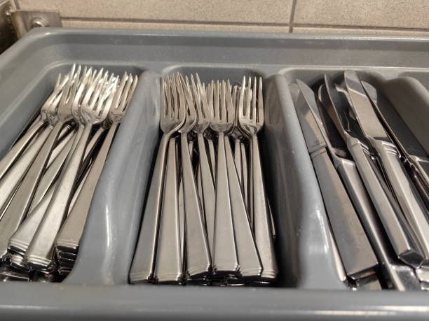 istock Clean Cutlery fork, spoon, knife on the bucket restaurant. 2153037820