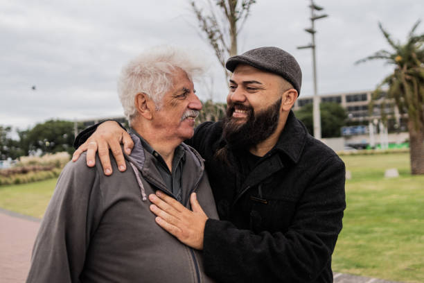 istock Father and son embracing outdoors 2153038986