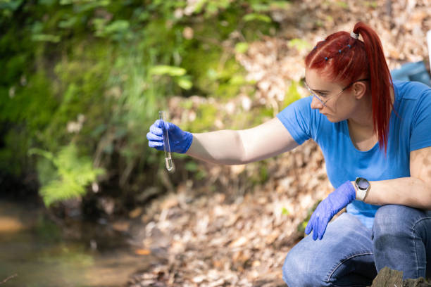 istock A young female biologist scientist taking water sample 2153039189