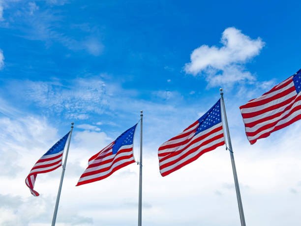 istock American Flags Blowing in the Wind 2153040895