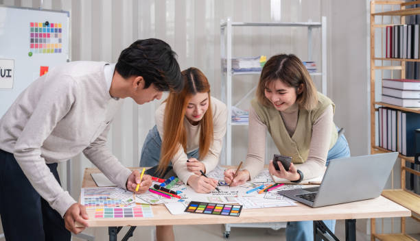 istock Application development team Brainstorming meeting and discussion to plan the design of ux ui and develop the system of applications on smartphones 2153041143