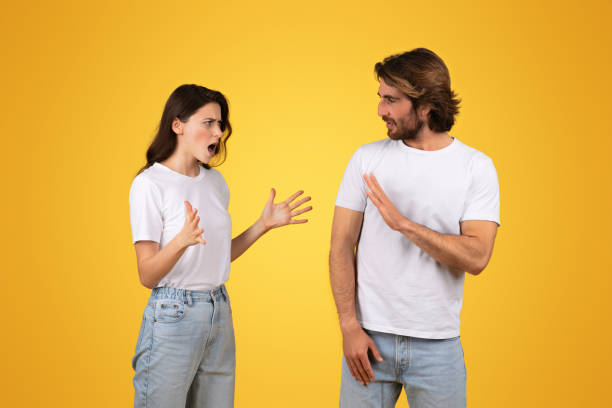 istock Animated conversation with a woman gesturing in surprise while talking and a man 2153049577