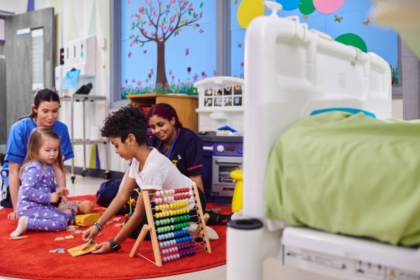 young hospital patients playing on children's ward