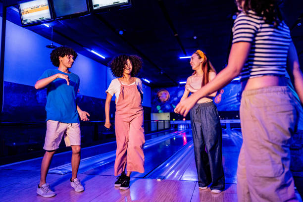 istock Friends dancing at party on a bowling alley 2153050675
