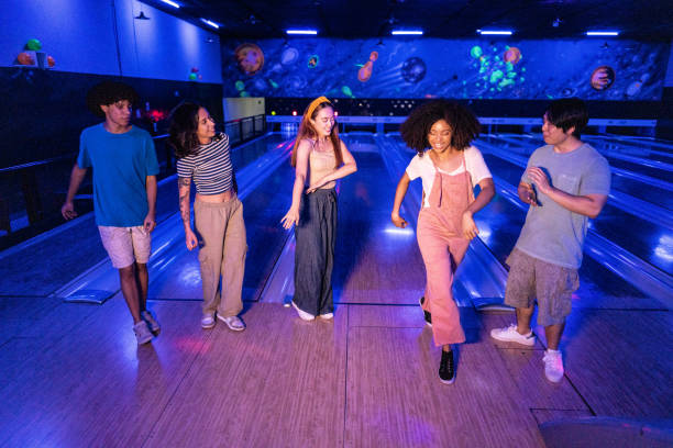 istock Friends dancing at party on a bowling alley 2153050716