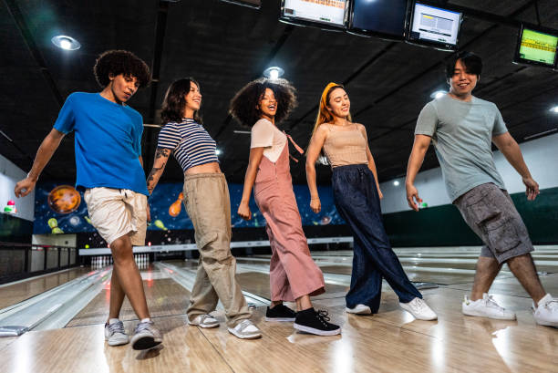 istock Friends dancing on a bowling alley 2153051101