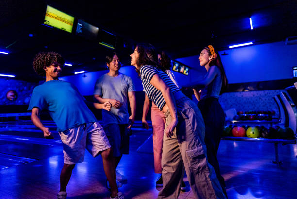 istock Friends dancing at party on a bowling alley 2153051128