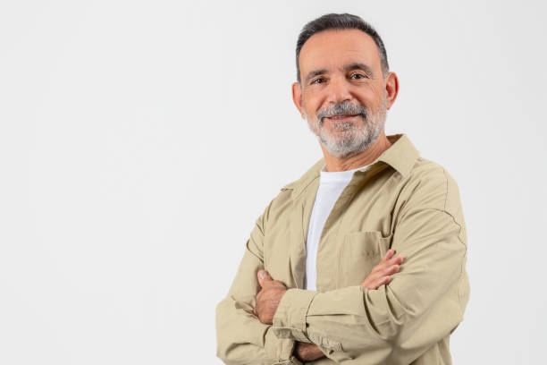 istock Handsome Senior Man Posing With Folded Arms Over White Studio Background 2153052365