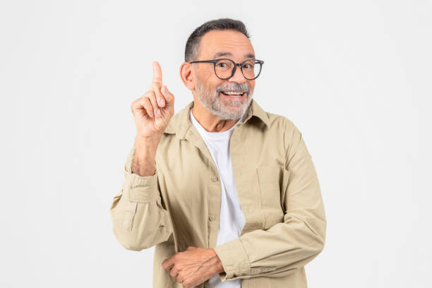 istock Senior man with index finger raised in a eureka moment 2153052464