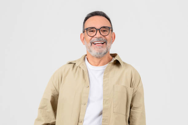 istock Smiling senior man with glasses and beard 2153052553