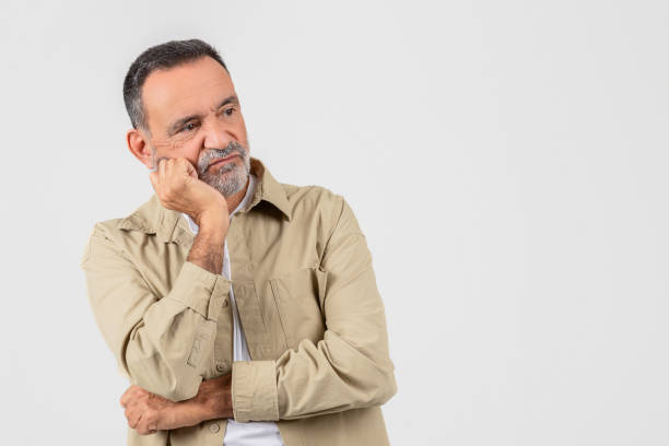istock Pensive senior man with folded arms, copy space 2153052568