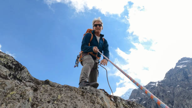 istock POV of mountain climber and rope 2153052842