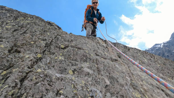 istock POV of mountain climber and rope 2153052846