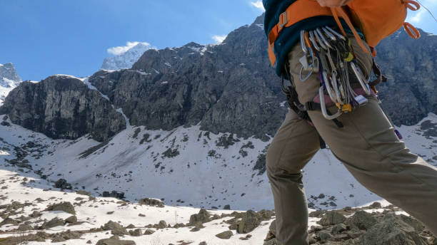 istock Low angle view of mountain climber 2153052860