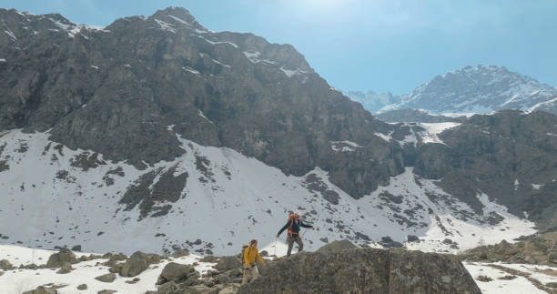 istock Aerial view of mountain climbers climbing 2153052903