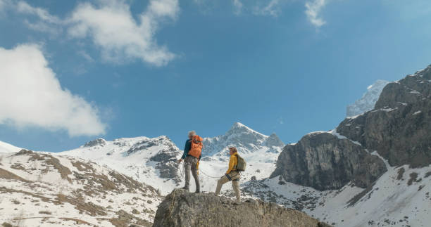 istock Aerial view of mountain climbers on mountain summit 2153052949