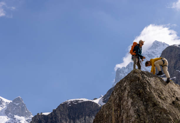 istock Aerial view of mountain climbers climbing 2153053059