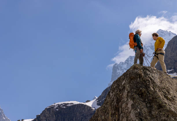 istock Aerial view of mountain climbers on mountain summit 2153053073