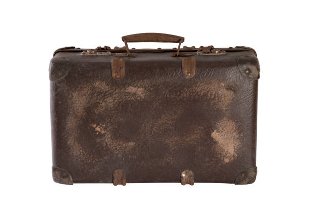 istock Old brown worn out suitcase isolated on white background with clipping path 2153057653