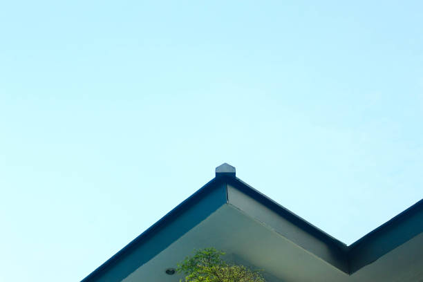 one corner of the building with a blue sky background